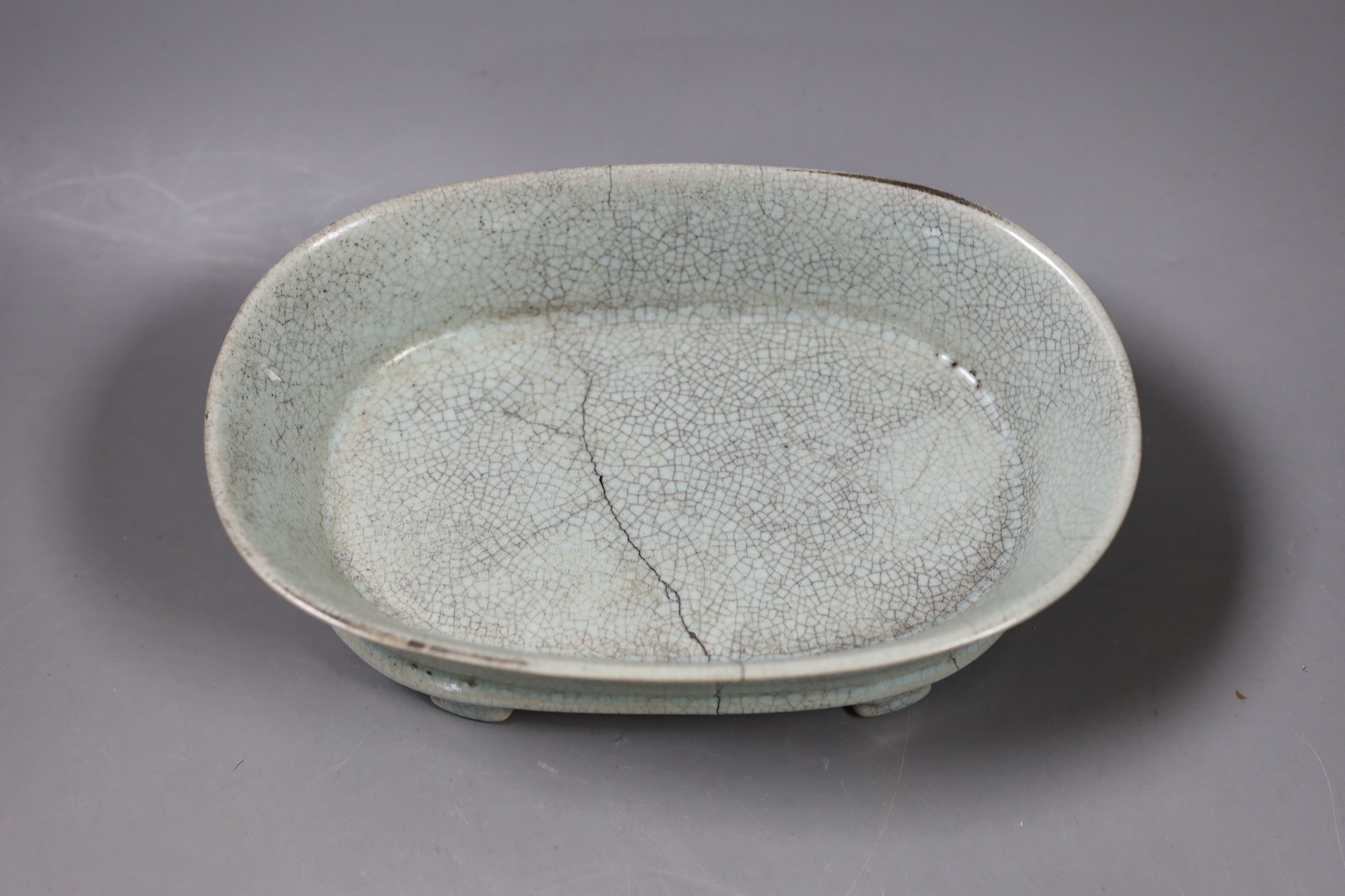 A Chinese Guan type ceramic crackle glaze narcissus bowl. 24cm wide, cracked